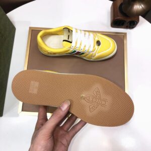 gucci distressed screener sneaker yellow