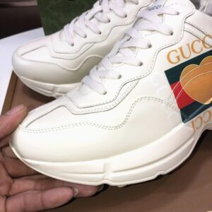 gucci rhyton clunky sneakers white orange