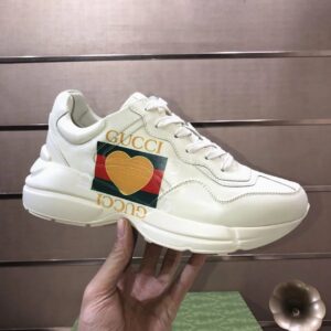 gucci rhyton clunky sneakers white orange