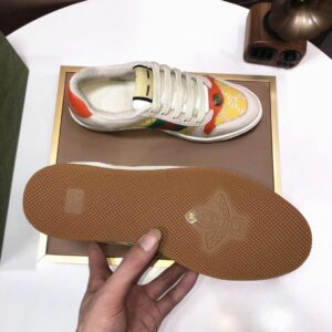 gucci distressed screener sneaker yellow