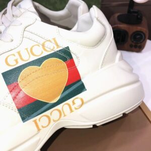 gucci rhyton clunky sneakers white orange
