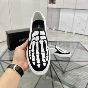 amiri slip on shoes black white