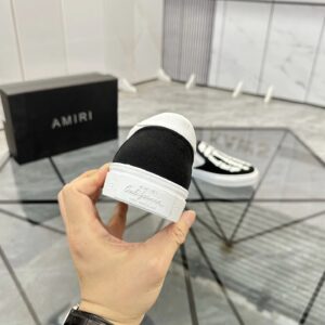 amiri slip on shoes black white