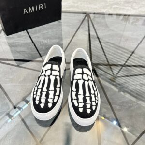 amiri slip on shoes black white