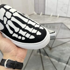 amiri slip on shoes black white