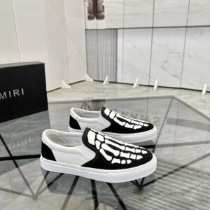 amiri slip on shoes black white