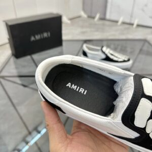 amiri slip on shoes black white