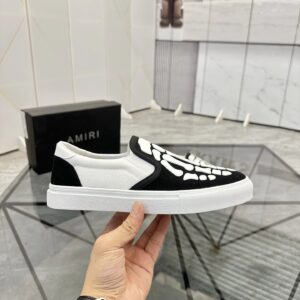 amiri slip on shoes black white