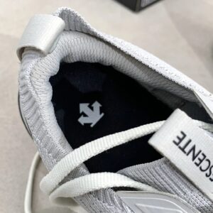 descente white sports shoes