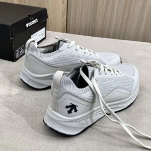 descente white sports shoes
