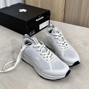 descente white sports shoes