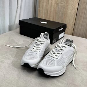 descente white sports shoes