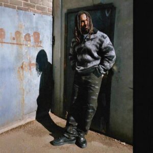 demon island camouflage knit sweater