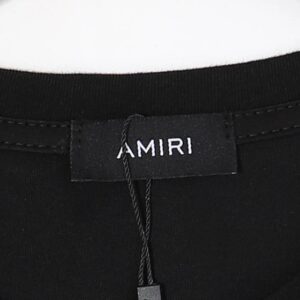 amiri paint splatter tee black white