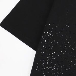 amiri paint splatter tee black white