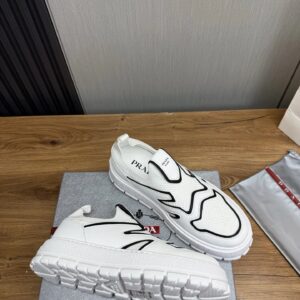 prada leather knit fabric slip on sneakers white black