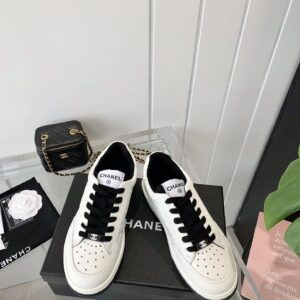 chanel white sneakers embossed logo