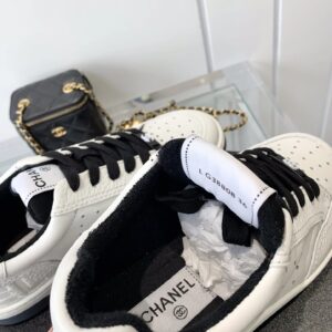 chanel white sneakers embossed logo
