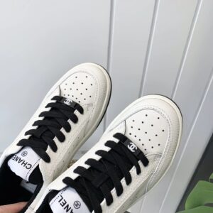 chanel white sneakers embossed logo