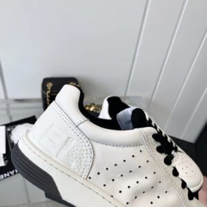 chanel white sneakers embossed logo