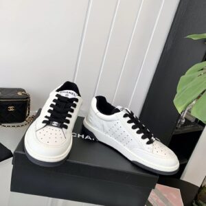 chanel white sneakers embossed logo