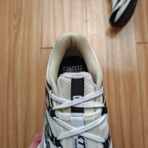 mm6 x salomon sctur 2 sneakers white black