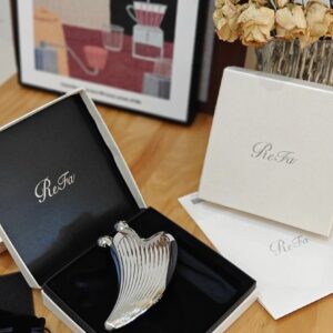 refa caxa ray​ facial roller